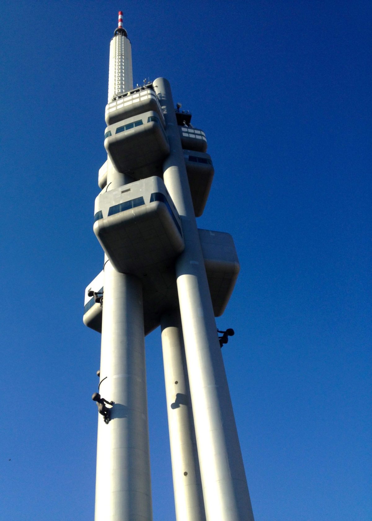 Czech artist David Černý "Babies," crawling alongside the Žižkov TV Tower, David Černý Prague Sculpture Guide