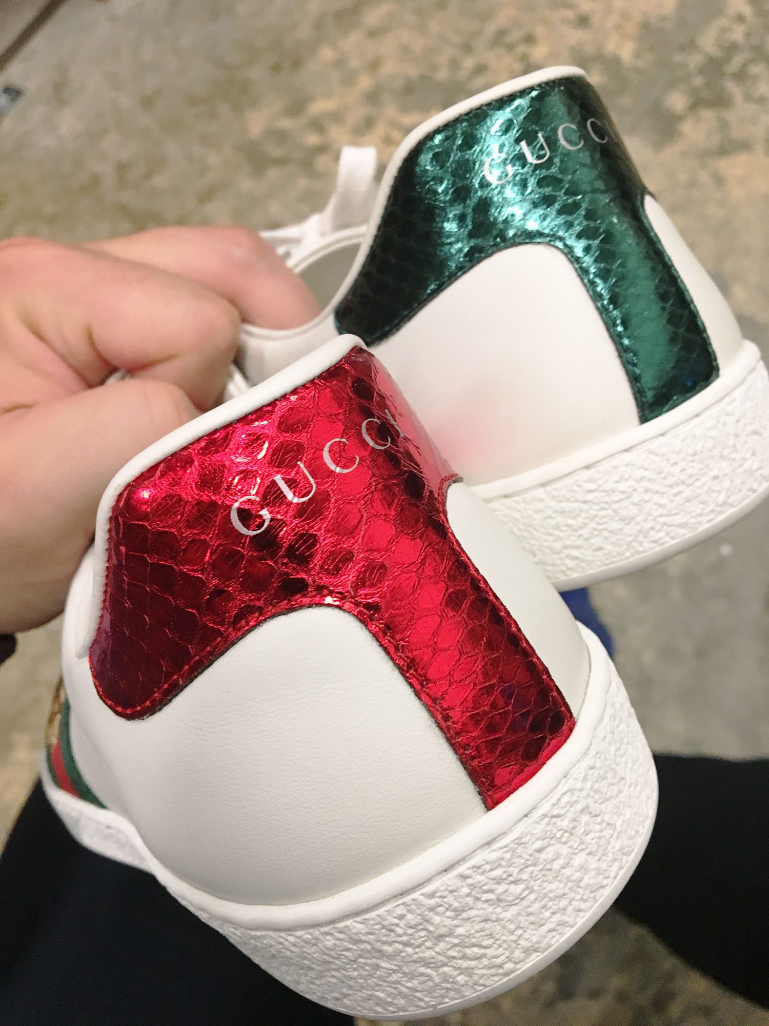 Gucci Ace Bee Sneaker has contrasting Gucci heels in red and green 
