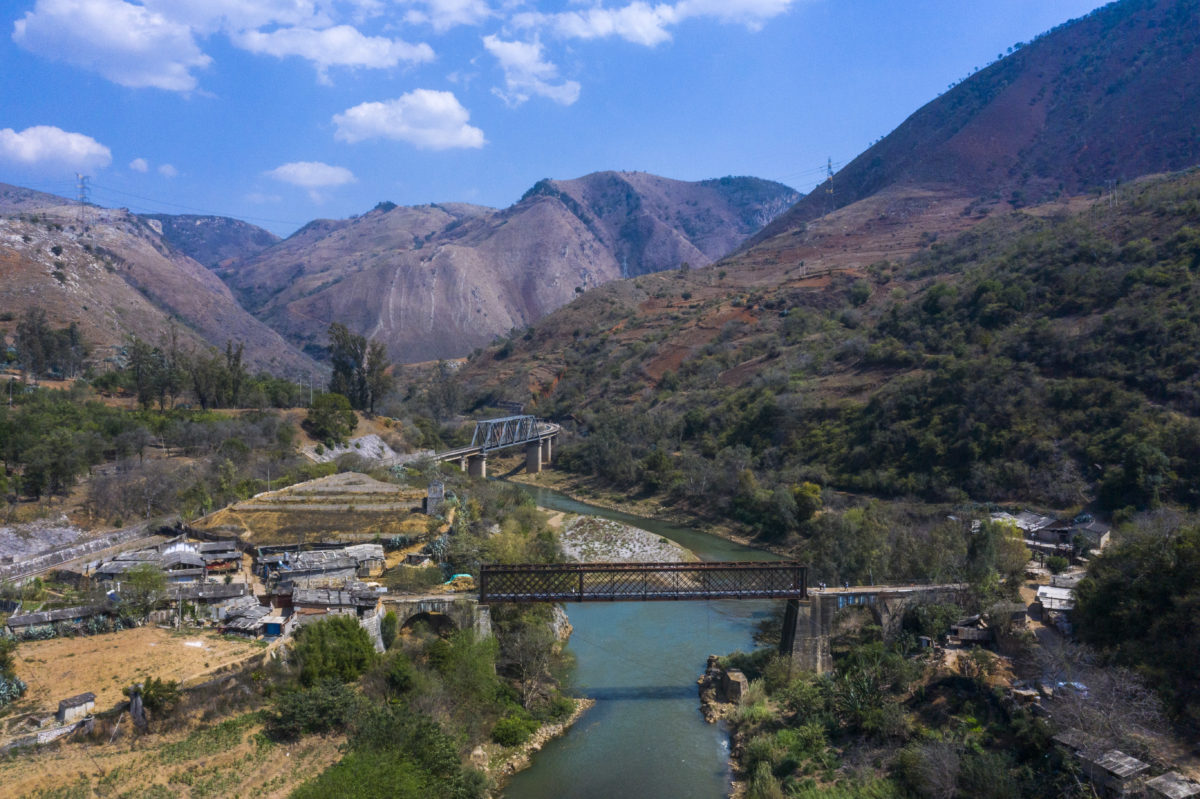 Bird's eye view of Flower Bridge and New Xiaolongtan Bridge in the outskirts of Honghe Prefecture's Kaiyuan City in southwest Yunnan